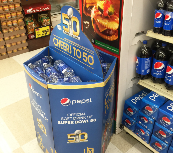 Custom dump bin display for showcasing loose items in a retail store.